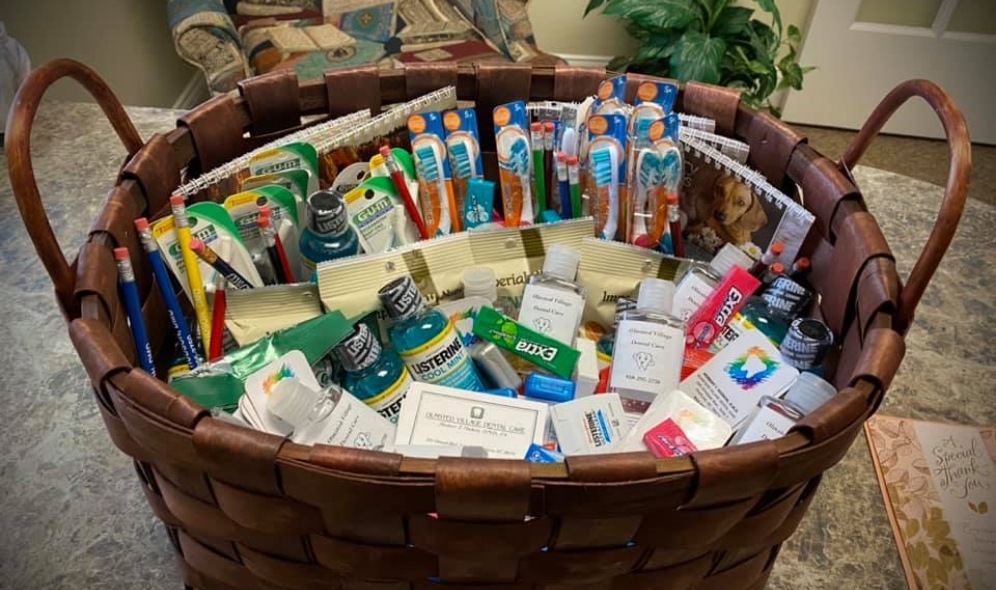 Gift basket filled with oral healthcare supplies