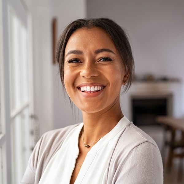 Woman smiling after root canal therapy