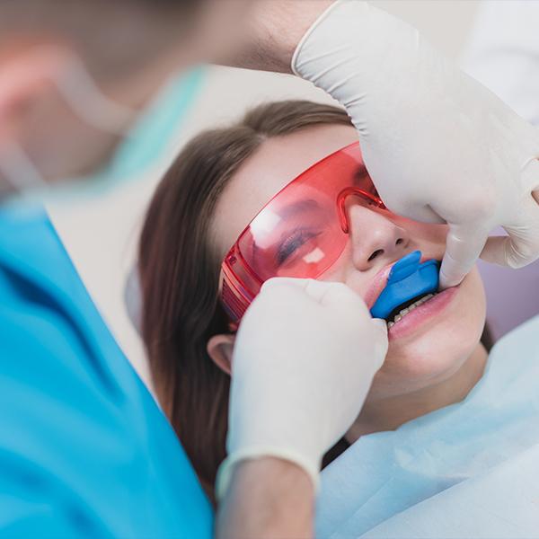 Patient receiving fluoride treatment