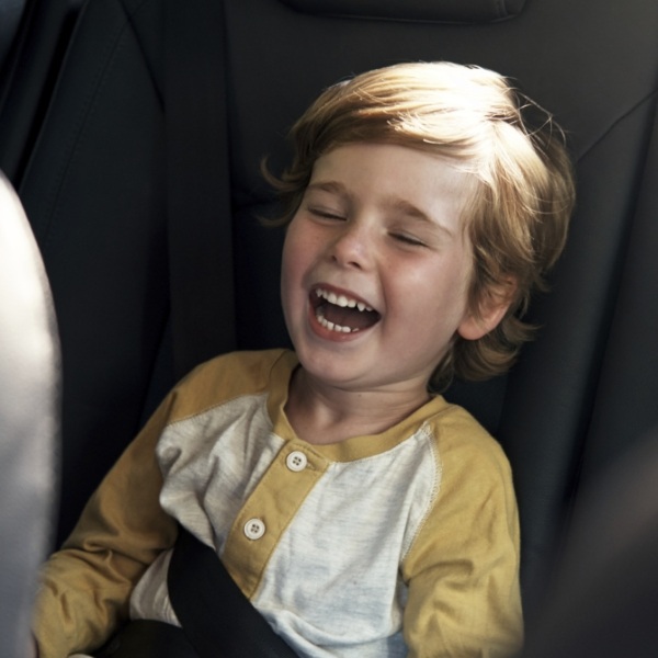 Child laughing after receiving dental sealants