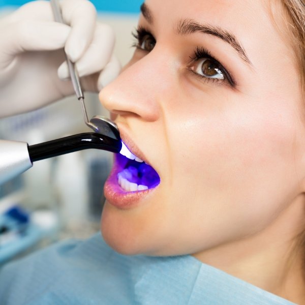 Patient receiving dental bonding