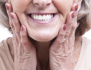 Closeup of patient’s smile with dental implants in Taylortown
