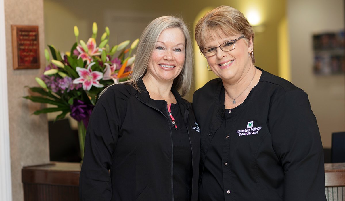 Two dental office team members