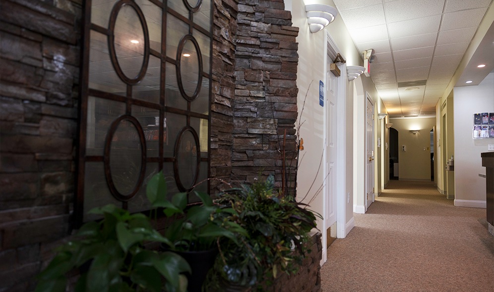 Hallway leading to dental treatment rooms