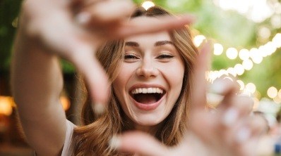 Woman sharing gorgeous smile after cosmetic dentistry