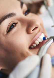 Woman having her teeth cleaned